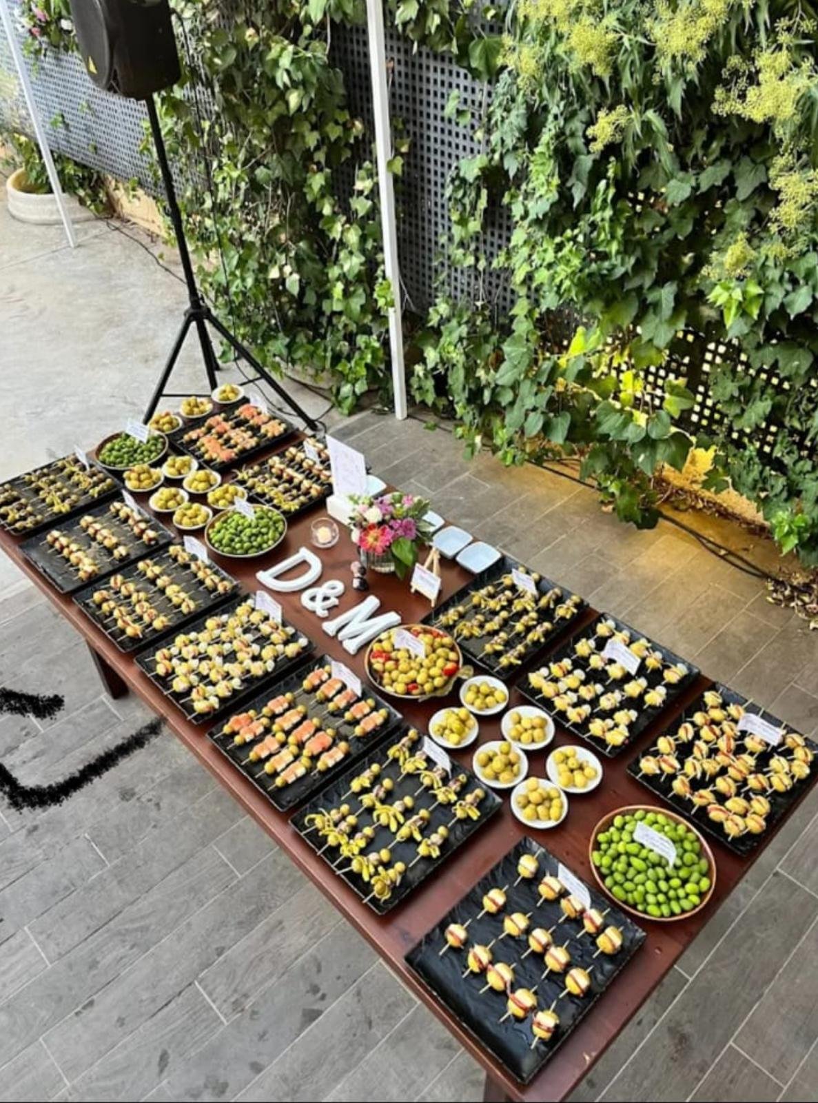 Gran mesa de Olives Dasi en un evento